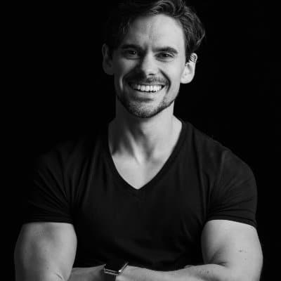 Portrait shot of Tom Wolt, laughing friendly